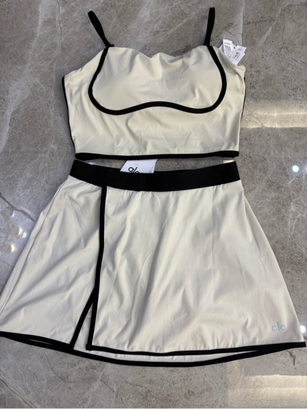 ALO Yoga Cream and Black Backless Crop Top with Matching Skirt